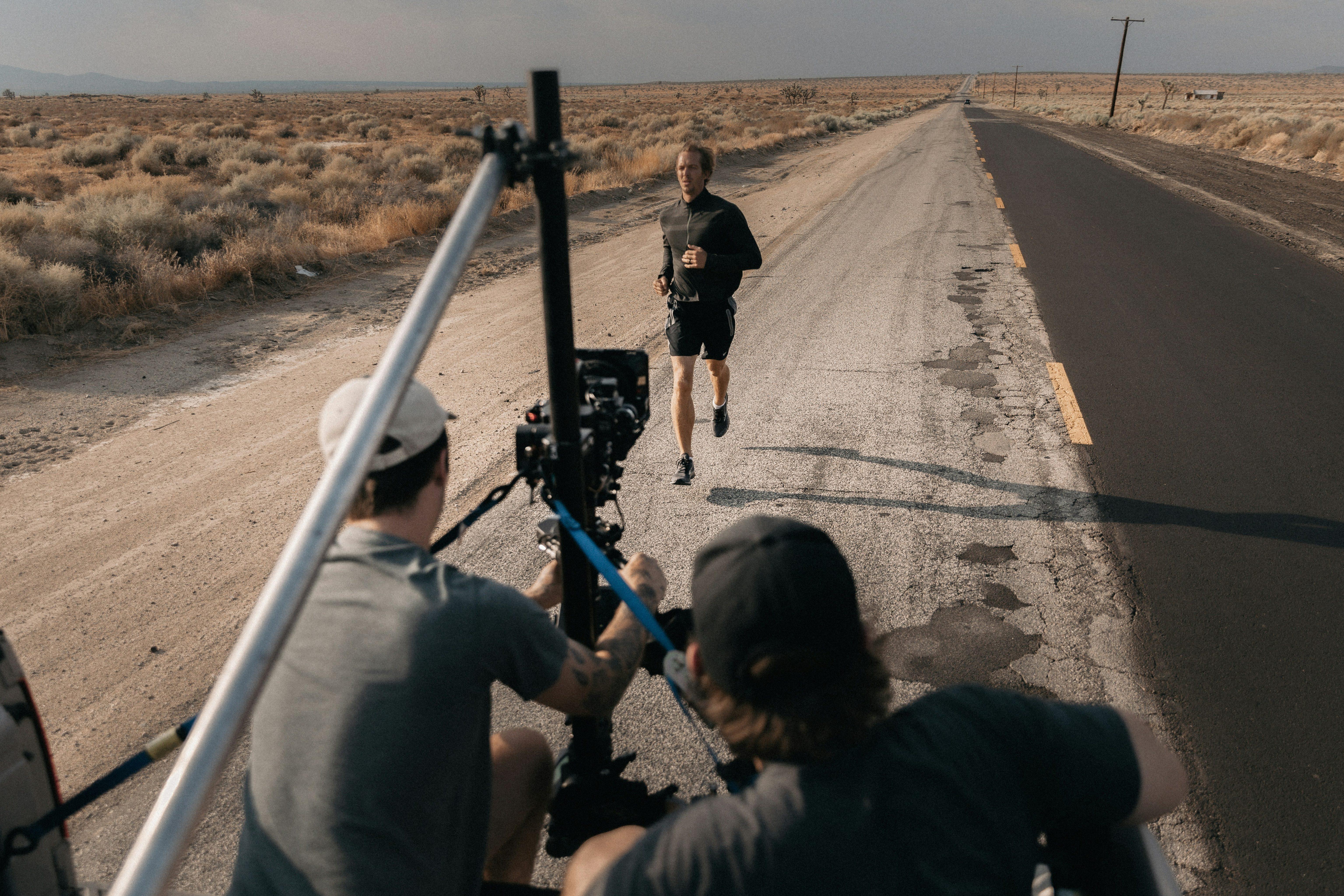 Video Production Equipment in Action: Film Crew on Location Shoot