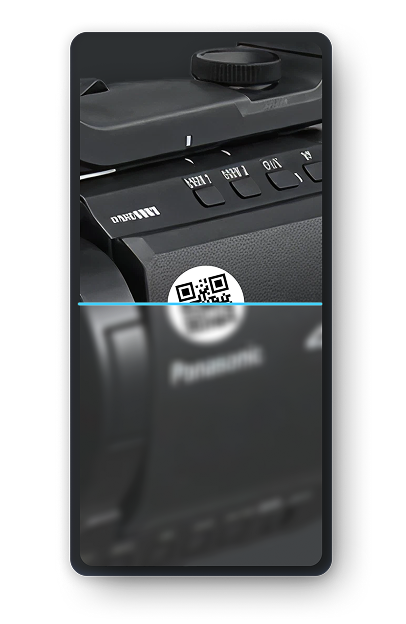 Photo of a QR code being scanned on a camera